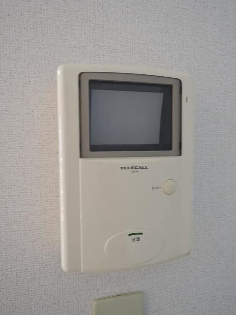 �y�Z�L�����e�B�z�@